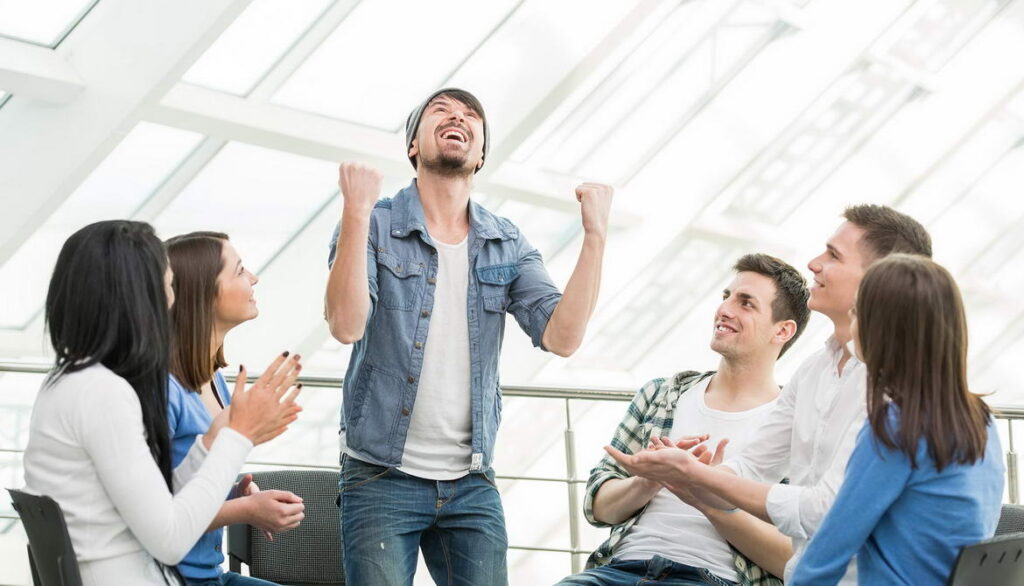 group therapy session discussing the importance of emotion regulation