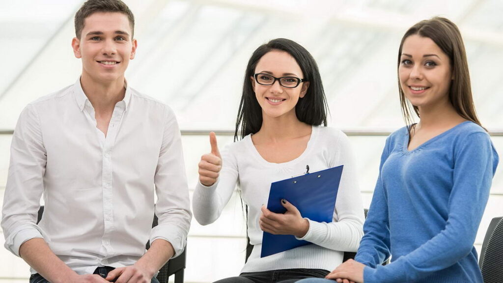 therapist explaining how feelings are created and regulated in a group session